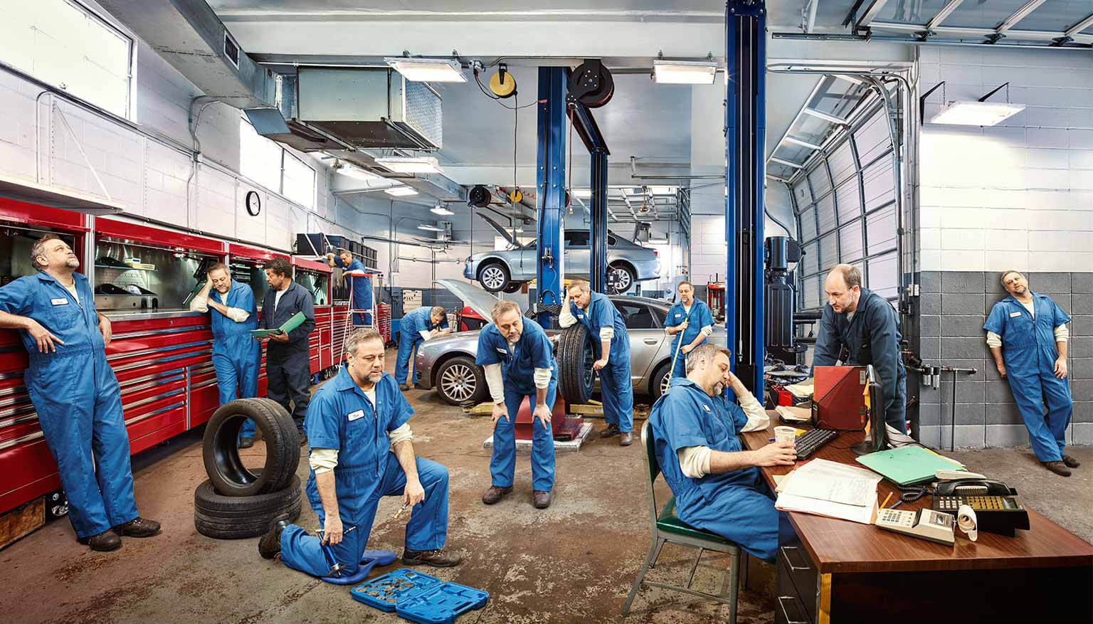 Exhausted mechanic with adult NTM pictured throughout the day at the garage
